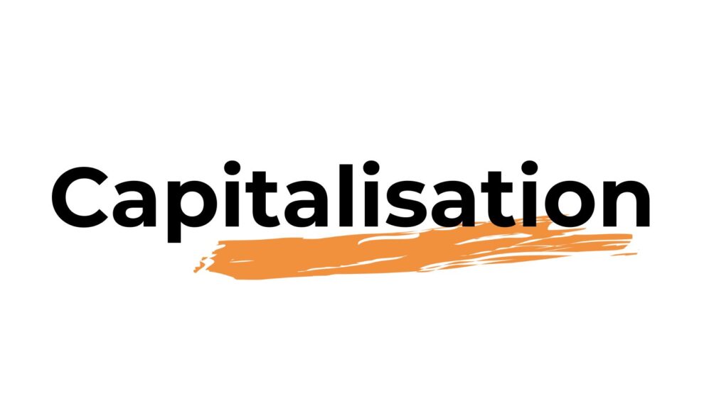 Mot "capitalisation" écrit en noir sur fond blanc